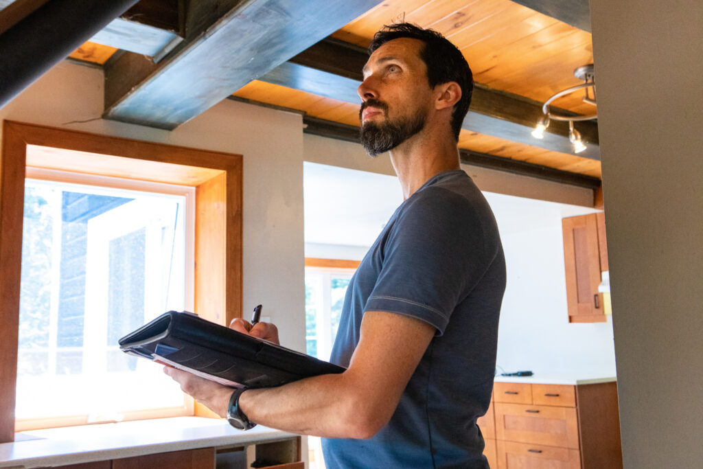 man conducting house safety inspection