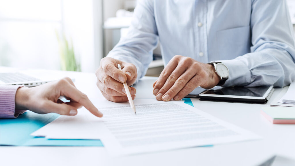 landlord reading over insurance documents