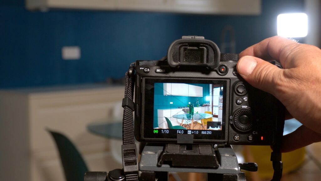 lettings agent photographing apartment